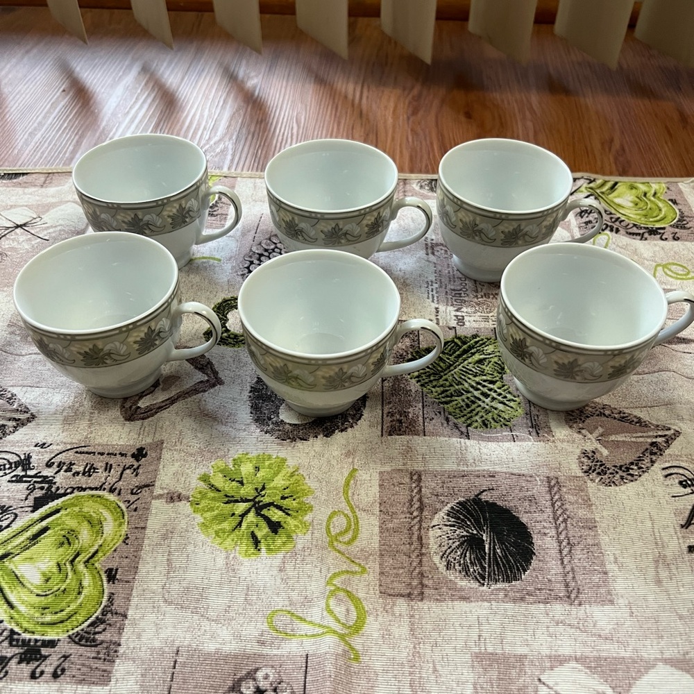 Classic White and Gray Tea Cup with Floral Design